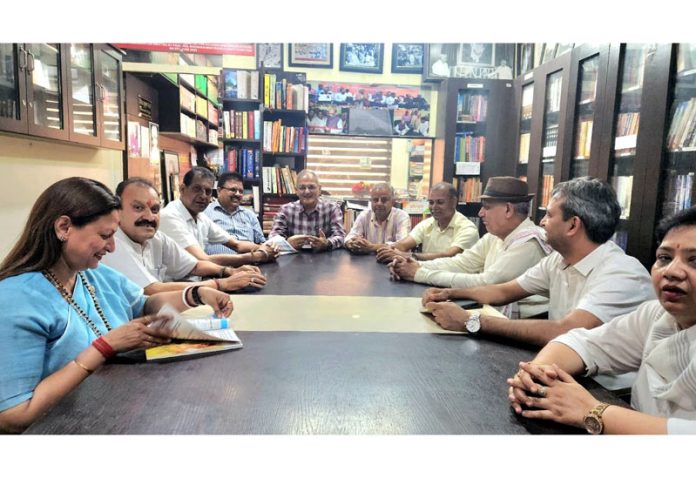 Kavinder Gupta and other senior BJP leaders during a meeting at Party Headquarters in Jammu.