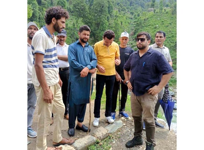 DDC Rajouri Abhishek Sharma interacting with people during visit of Darhal area.