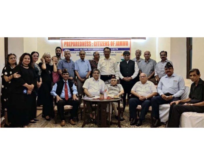 Dignitaries posing for a group photograph during a function organized in Jammu.