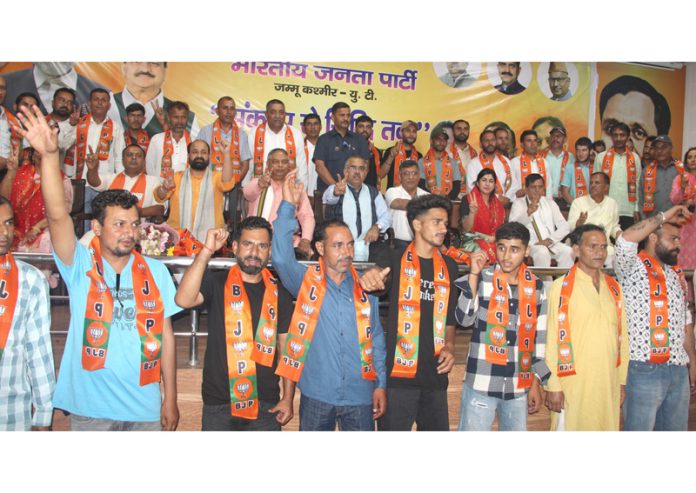 Congress leaders and others joining BJP at party headquarters in Jammu on Thursday.