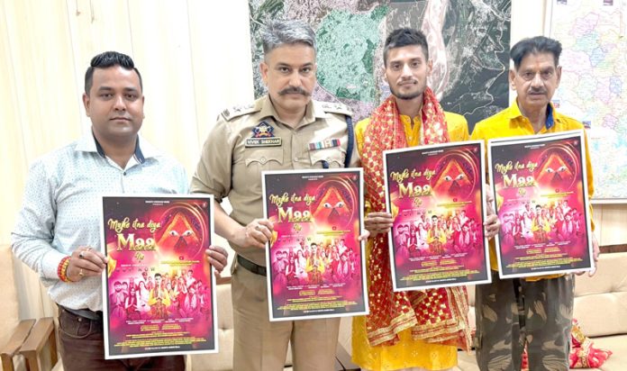 SP Jammu North, Vivek Shekhar, releasing a poster of devotional bhajan in Jammu on Thursday.