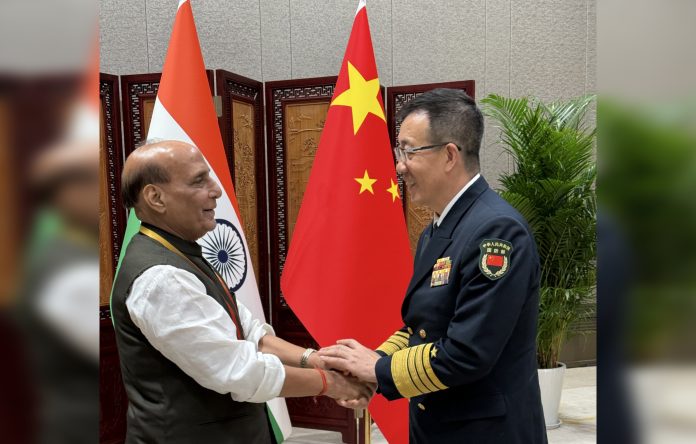 rajnath Defence Minister Rajnath Singh meets Chinese counterpart Admiral Dong Jun in Qingdao, China (UNI)