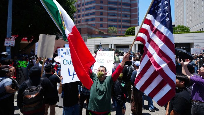 LA police swiftly enforce downtown curfew as protests  against Trump's immigration crackdown continue