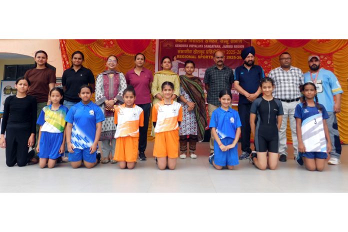 Participants posing along with dignitaries during a programme.