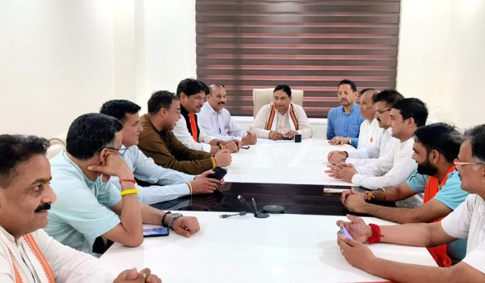 Sat Sharma chairing BJP organizational meeting at the party headquarters in Jammu on Monday.
