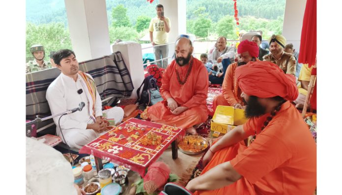 Religious ceremonies of holy mace being performed by Sadhus and devotees led by Mahant Deependra Giri Ji at Pahalgam on Thursday. - Excelsior/Sajad Dar