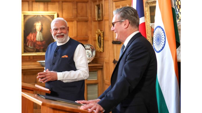 Prime Minister Narendra Modi and United Kingdom Prime Minister Keir Starmer address a joint press meet at London in United Kingdom on Thursday. (UNI) Prime Minister Narendra Modi and United Kingdom Prime Minister Keir Starmer address a joint press meet at London in United Kingdom on Thursday. (UNI)