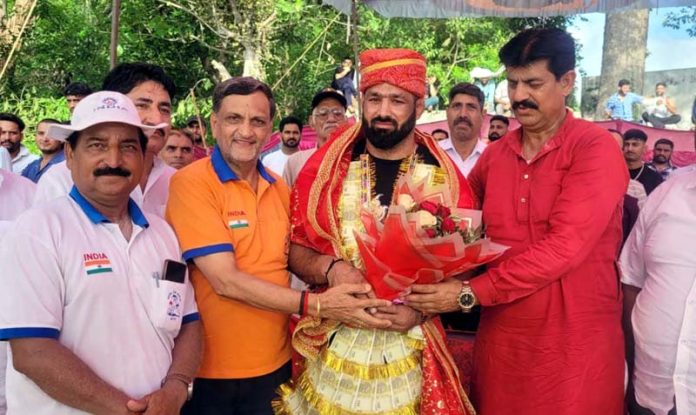Wrestler receiving bouquet from dignitaries. Wrestler receiving bouquet from dignitaries.