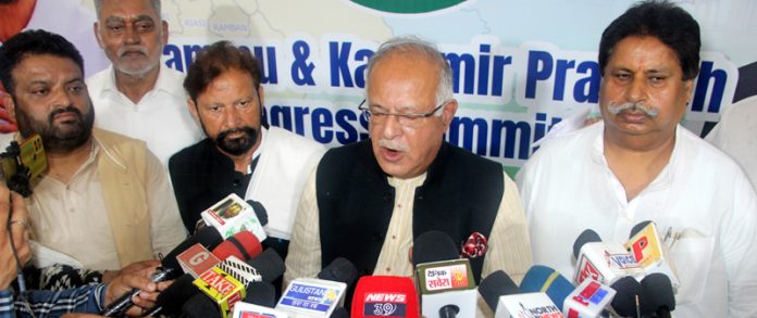 JKPCC chief Tariq Hameed Karra flanked by others talking to media persons in Jammu on Saturday. -Excelsior/Rakesh JKPCC chief Tariq Hameed Karra flanked by others talking to media persons in Jammu on Saturday. -Excelsior/Rakesh