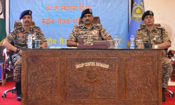 CRPF officers during the 87th Raising Day celebration event in Srinagar on Sunday. CRPF officers during the 87th Raising Day celebration event in Srinagar on Sunday.