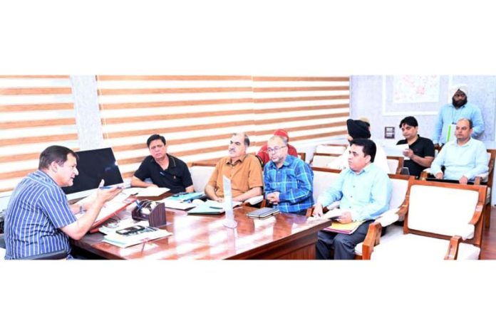 Agriculture Minister Javid Dar chairing a meeting in Srinagar.