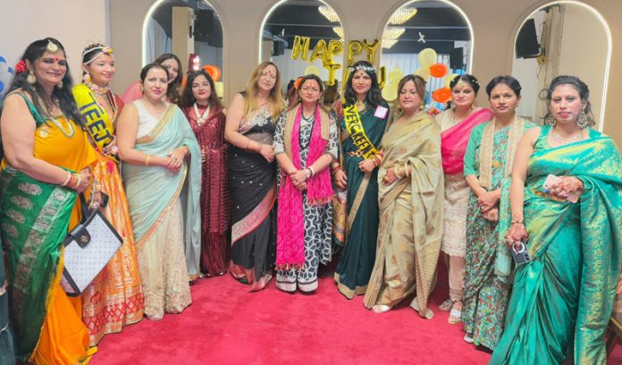 BJP leader Rekha Mahajan along with BVP Ladies Club members during Teej Festival celebration.