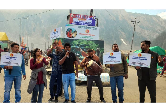 A team of Indore-based startup ‘Swaha’ making the Amarnath pilgrims aware about keeping the track garbage free. A team of Indore-based startup ‘Swaha’ making the Amarnath pilgrims aware about keeping the track garbage free.