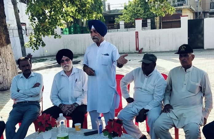 JKSAC president Gurdev Singh during meeting of DPs in Jammu.