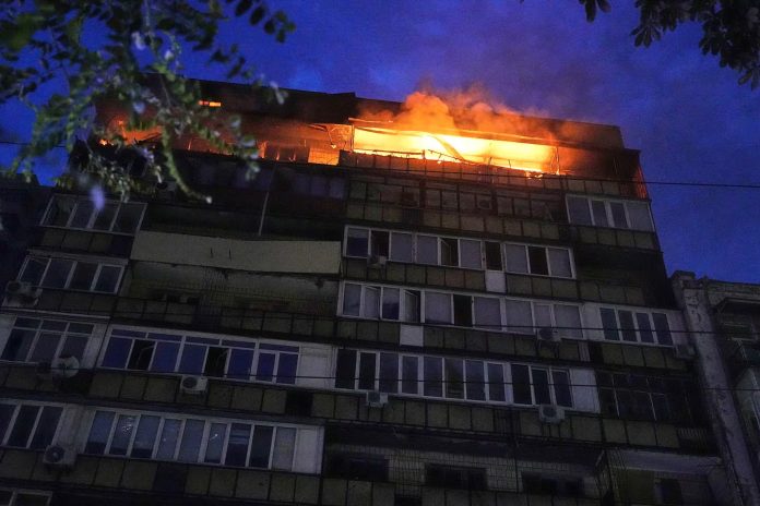 Russia hits Kyiv with more missiles, drones, causing fires, killing 2 Russia hits Kyiv with more missiles, drones, causing fires, killing 2