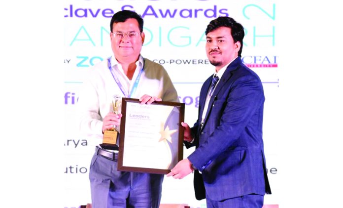 Dr Anshu Kataria, chairman, Aryans Group receiving an award on Tuesday.