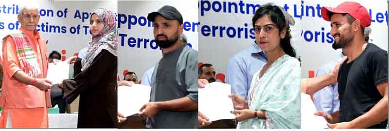 LG Manoj Sinha handing over appointment letters to members of terror victim families in Baramulla on Sunday.