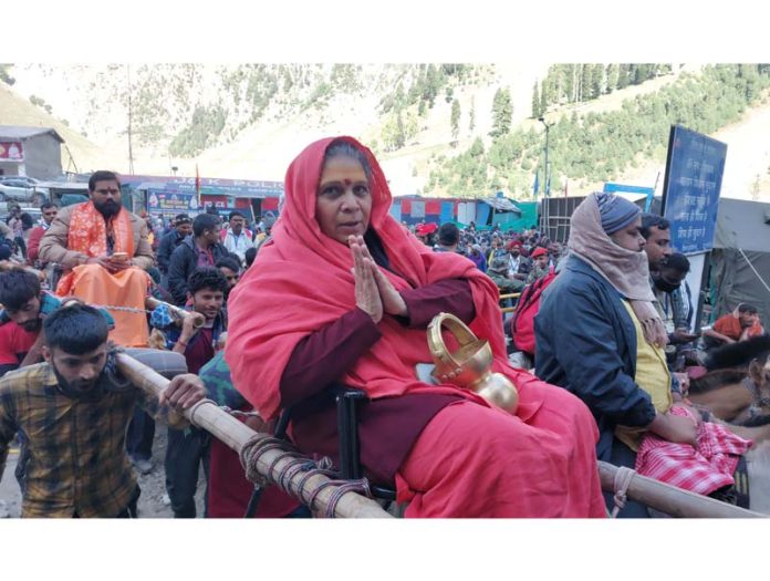 Pilgrims head for Shri Amarnath Ji cave shrine from Baltal on Saturday. -Excelsior/Firdous Pilgrims head for Shri Amarnath Ji cave shrine from Baltal on Saturday. -Excelsior/Firdous