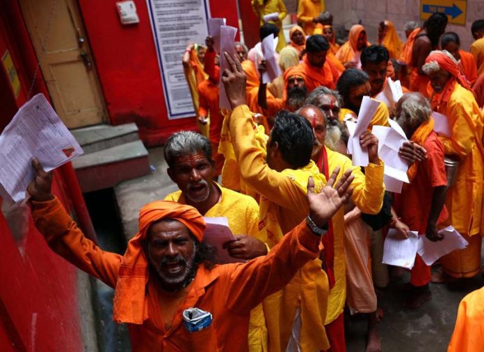 Shri Amarnath bound Sadhus at Ram Mandir on Monday. -Excelsior/Rakesh