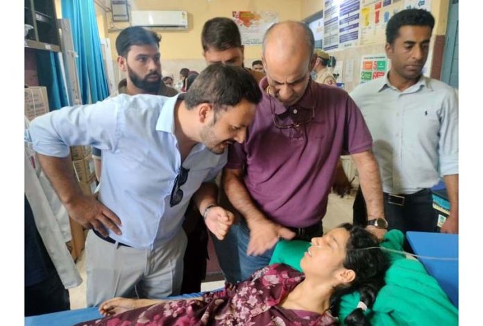 Students from GGHS Khrew receiving treatment at SDH Pampore in South Kashmir on Monday. -Excelsior/Younis Khaliq Students from GGHS Khrew receiving treatment at SDH Pampore in South Kashmir on Monday. -Excelsior/Younis Khaliq