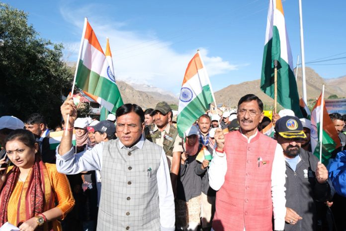 Union Ministers Mansukh Mandaviya and MoS Defence Sanjay Seth lead ‘Kargil Vijay Diwas’ padyatra at Drass on Saturday. Another pic on page 3.