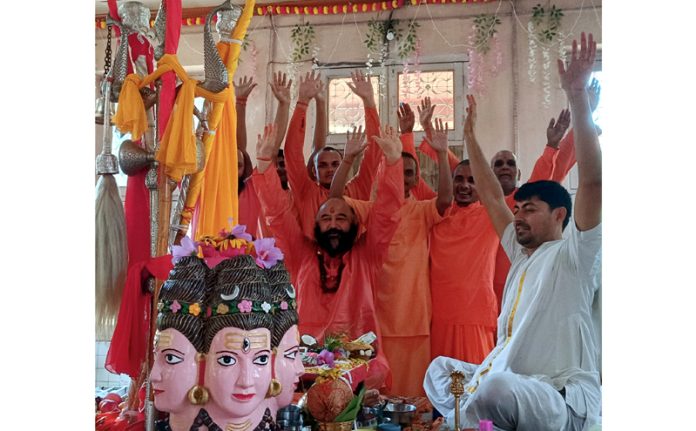 Mahant Deependra Giri and Sadhus performing Chhari Sthapana ceremony at Dashnami Akhara, Srinagar on Sunday. Mahant Deependra Giri and Sadhus performing Chhari Sthapana ceremony at Dashnami Akhara, Srinagar on Sunday.