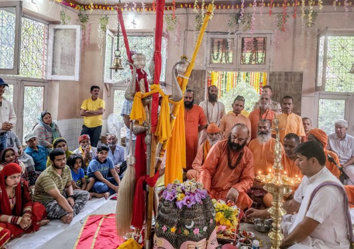 Mahant Deependra Giri Ji Maharaj and other Sadhus performing Puja of holy mace at Dashnami Akhara, Srinagar on the occasion of Nag Panchmi on Tuesday. —Excelsior/ Shakeel Mahant Deependra Giri Ji Maharaj and other Sadhus performing Puja of holy mace at Dashnami Akhara, Srinagar on the occasion of Nag Panchmi on Tuesday. —Excelsior/ Shakeel