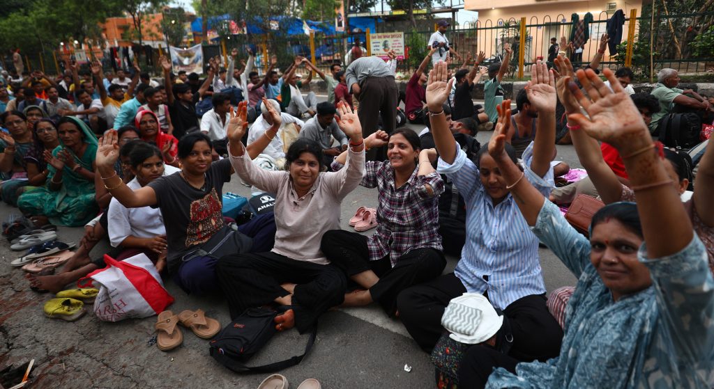 Jubilant Shri Amarnath Ji yatris chanting Bum Bum Bhole at Saraswati Dham in Jammu on Monday. —Excelsior/Rakesh