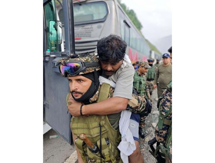 An injured pilgrim being shifted to hospital for treatment. -Excelsior/Shubam Anthal An injured pilgrim being shifted to hospital for treatment. -Excelsior/Shubam Anthal