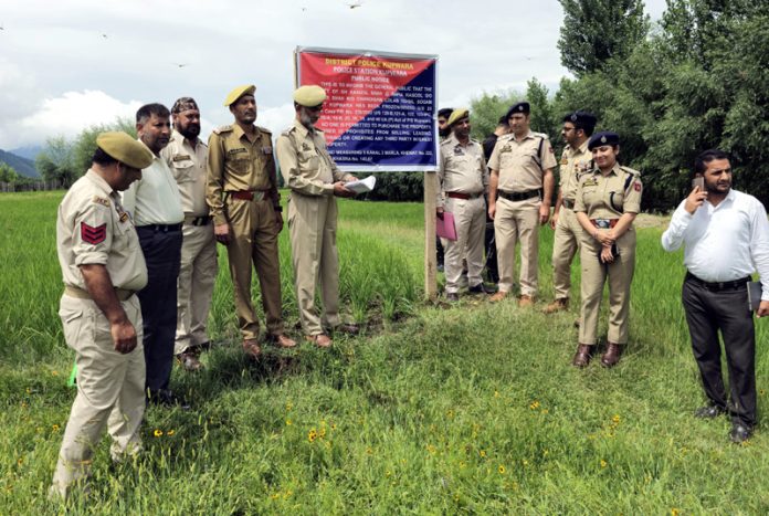 Property of terror handler being attached by police in Sogam, Kupwara. Property of terror handler being attached by police in Sogam, Kupwara.