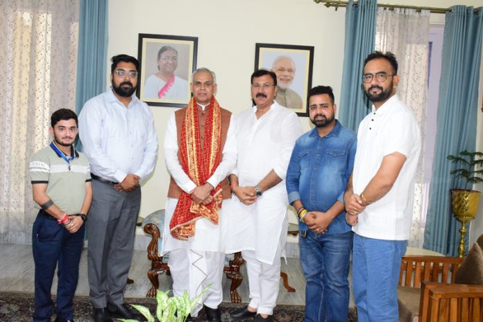 BJP MLA Jammu West, Arvind Gupta during a meeting with Gujarat Governor, Acharya Devvrat at Jammu.