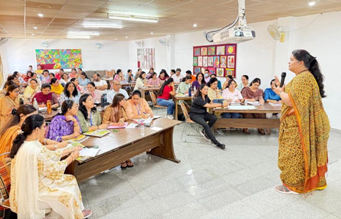 Councillor speaking during a programme. Councillor speaking during a programme.