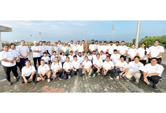 Weightlifters posing for a group photograph.