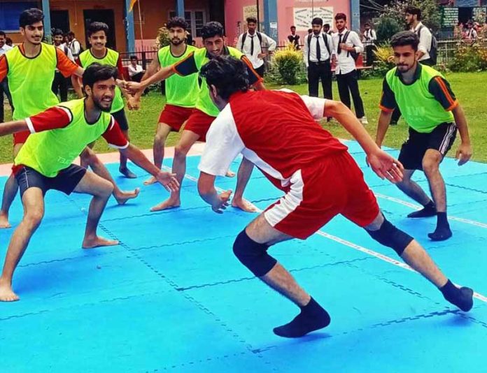 Players in action during a Kabaddi match at Inter-District Zonal Level Competitions.