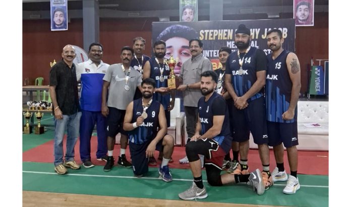 J&K Masters Basketball team receiving runners-up trophy from a dignitary at 2nd Jacob Koshy Memorial Championship 2025.