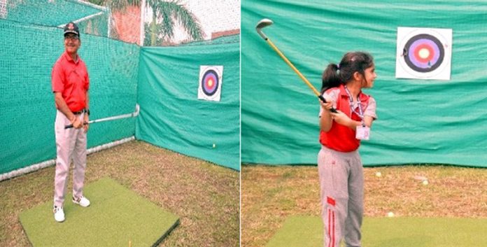 Golfers in action during a practice session.