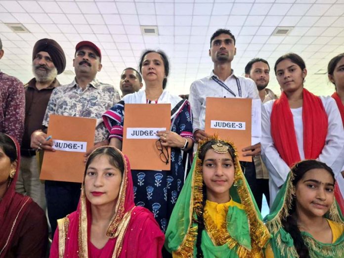Participants and organisers of 'Youth Engage' programme posing for a group photograph in Udhampur on Saturday.