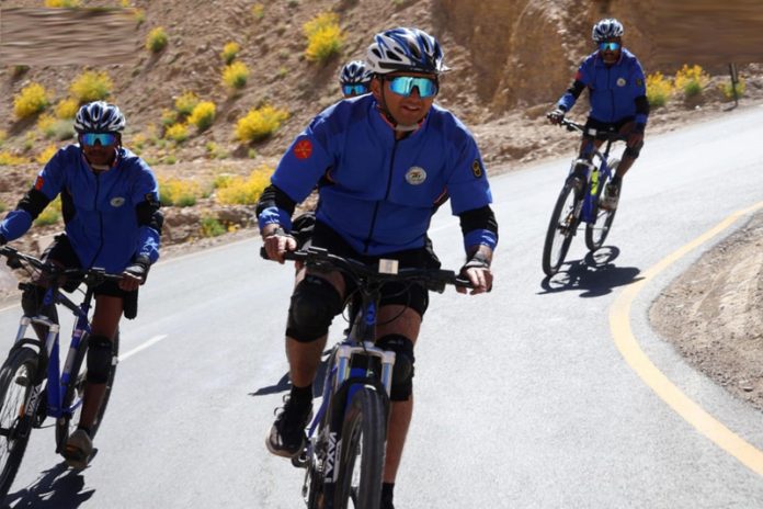 Bicycle riders in action during expedition. Bicycle riders in action during expedition.