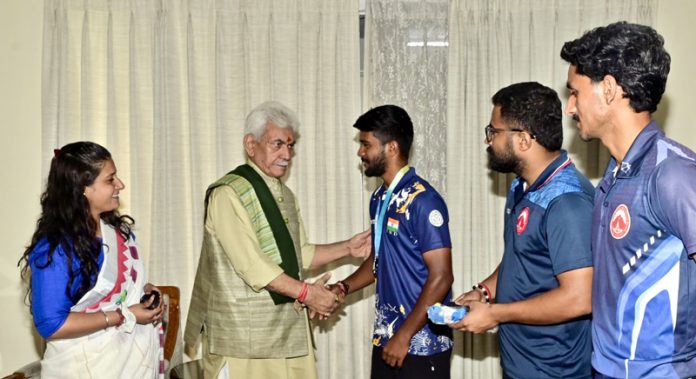 A delegation of National-level Archers meeting LG Manoj Sinha in Jammu on Monday. A delegation of National-level Archers meeting LG Manoj Sinha in Jammu on Monday.