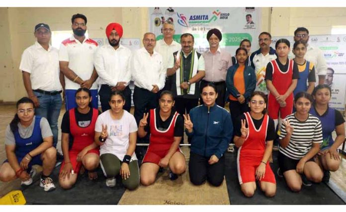 MLA Bahu Vikram Randhawa posing along with weightlifters. MLA Bahu Vikram Randhawa posing along with weightlifters.