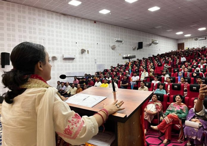 MLA Shagun Parihar addressing gathering during ABVP event for felicitation of meritorious students and athletes at Kishtwar on Tuesday.