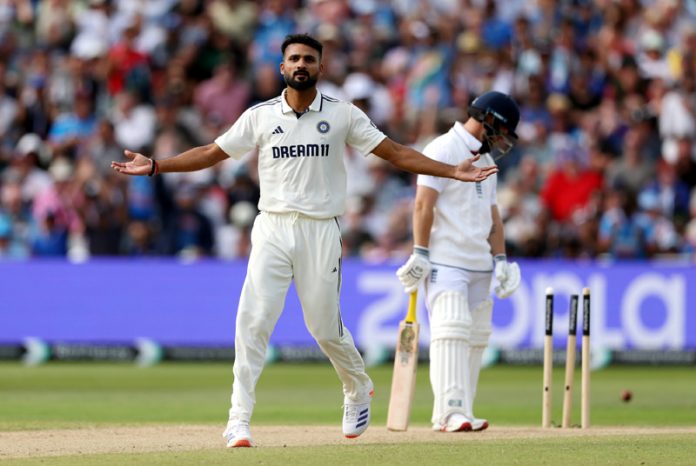 Akash Deep celebrating after taking a wicket against England in Birmingham. Akash Deep celebrating after taking a wicket against England in Birmingham.