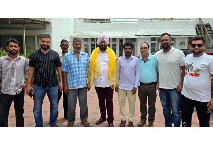 DDC Suchetgarh member, Taranjit Singh Tony posing along with others, who joined the Congress party in Jammu.