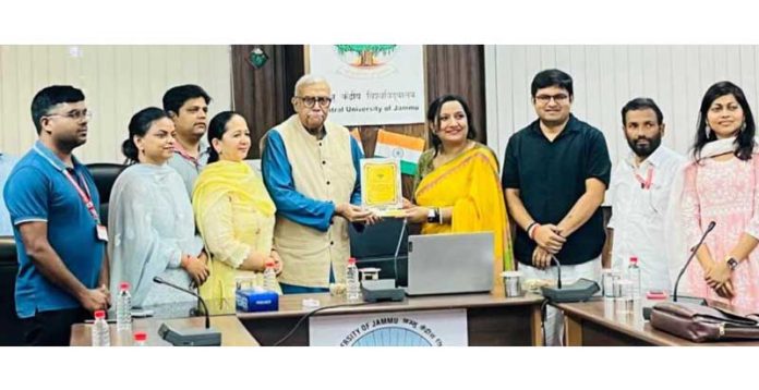 Prof Lalit Gupta being presented a memento during Thursday Mind Meet at CUJ.