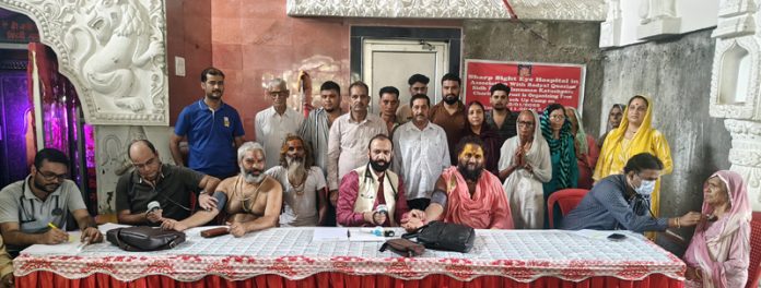 HoD Cardiology GMC & SSH Jammu Dr Sushil Sharma examining the patients at RS Pura on Sunday. HoD Cardiology GMC & SSH Jammu Dr Sushil Sharma examining the patients at RS Pura on Sunday.