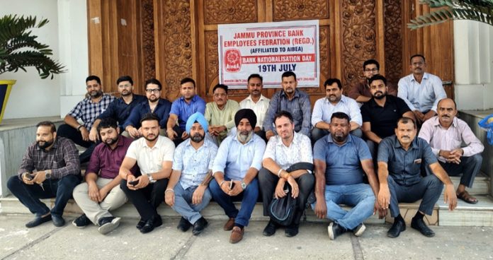 Members of JPBEF posing for a group photograph on 56th Bank Nationalization Day at Jammu on Saturday.