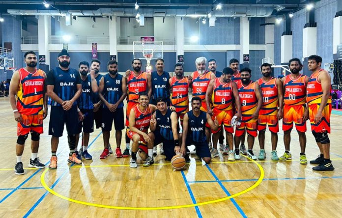 J&K Masters Basketball team posing for group photograph.