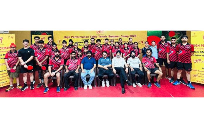 Players posing along with dignitaries during closing ceremony.