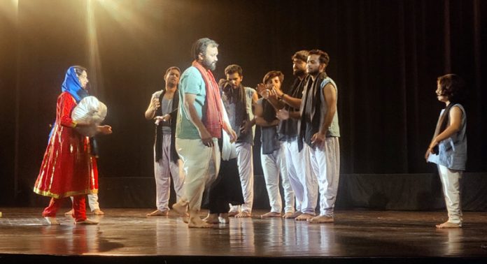 A scene from a play staged on day 1 of Dogri Theatre Competition in Jammu on Monday.