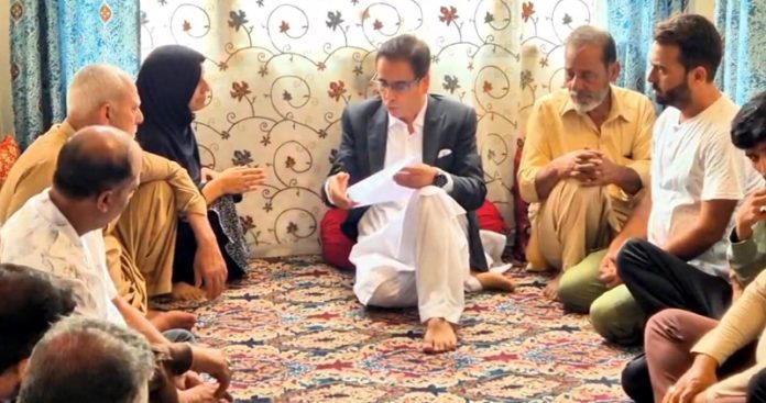 NC MLA Tanvir Sadiq during visit to a road accident victim family in Srinagar. NC MLA Tanvir Sadiq during visit to a road accident victim family in Srinagar.